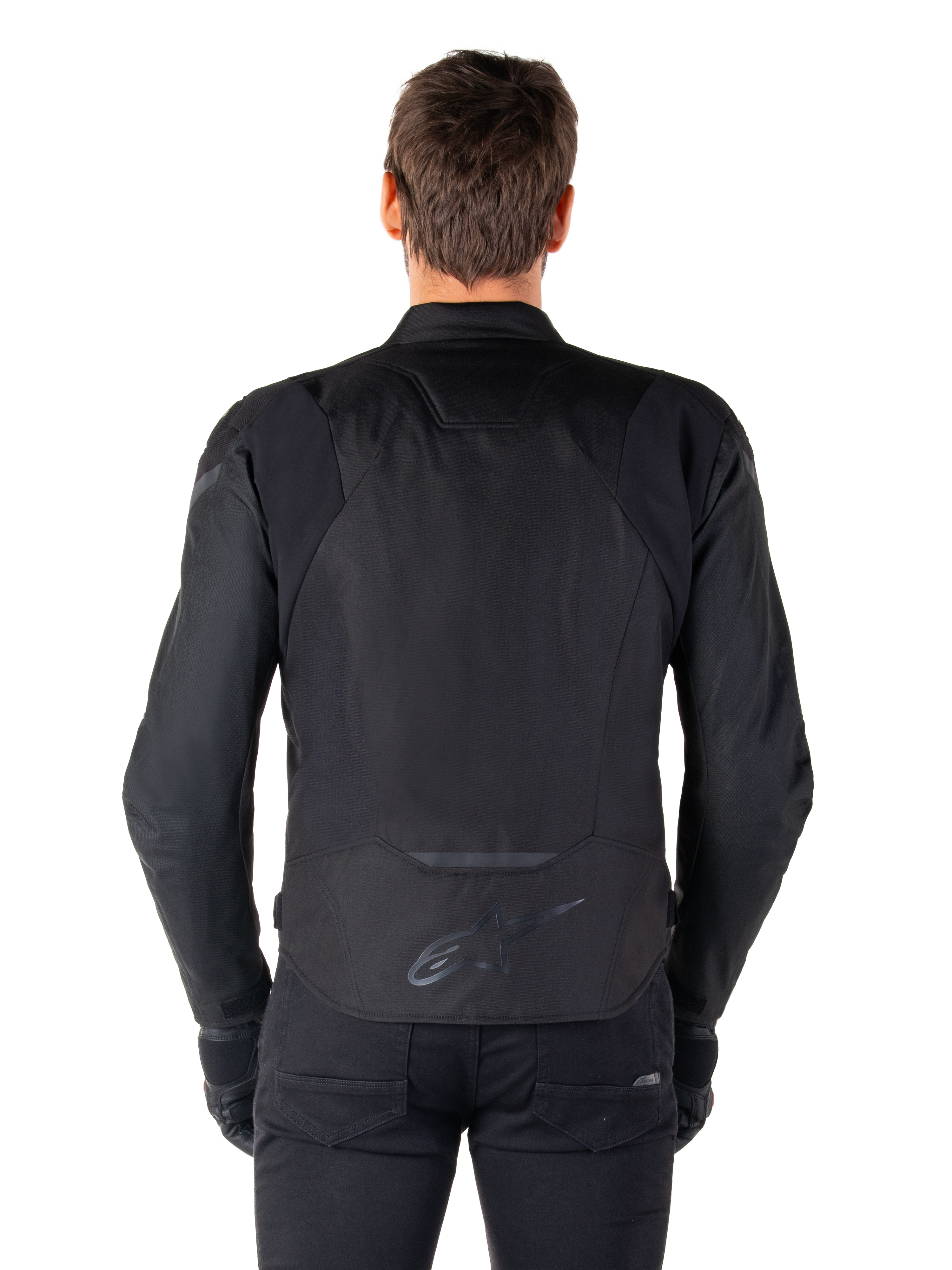 Giacca impermeabile Alpinestars T-Jaws V4, giacca da moto in tessuto, nero, vista posteriore con logo Alpinestars sulla parte bassa della schiena, vestibilità sportiva per la guida su strada