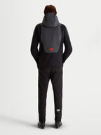 Alpinestars Aeroshell Wp Giacca, giacca da moto impermeabile da uomo in nero e grigio scuro, vista posteriore con cappuccio integrato e logo rosso Alpinestars