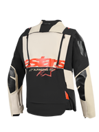 Giacca Alpinestars Halo Pro Drystar® XF Laminated, vista posteriore, costruzione in tessuto Mastic Black e panna, logo 'stars' rosso acceso al centro, doppie cerniere verticali per ventilazione modulare, abbigliamento tecnico da moto adventure