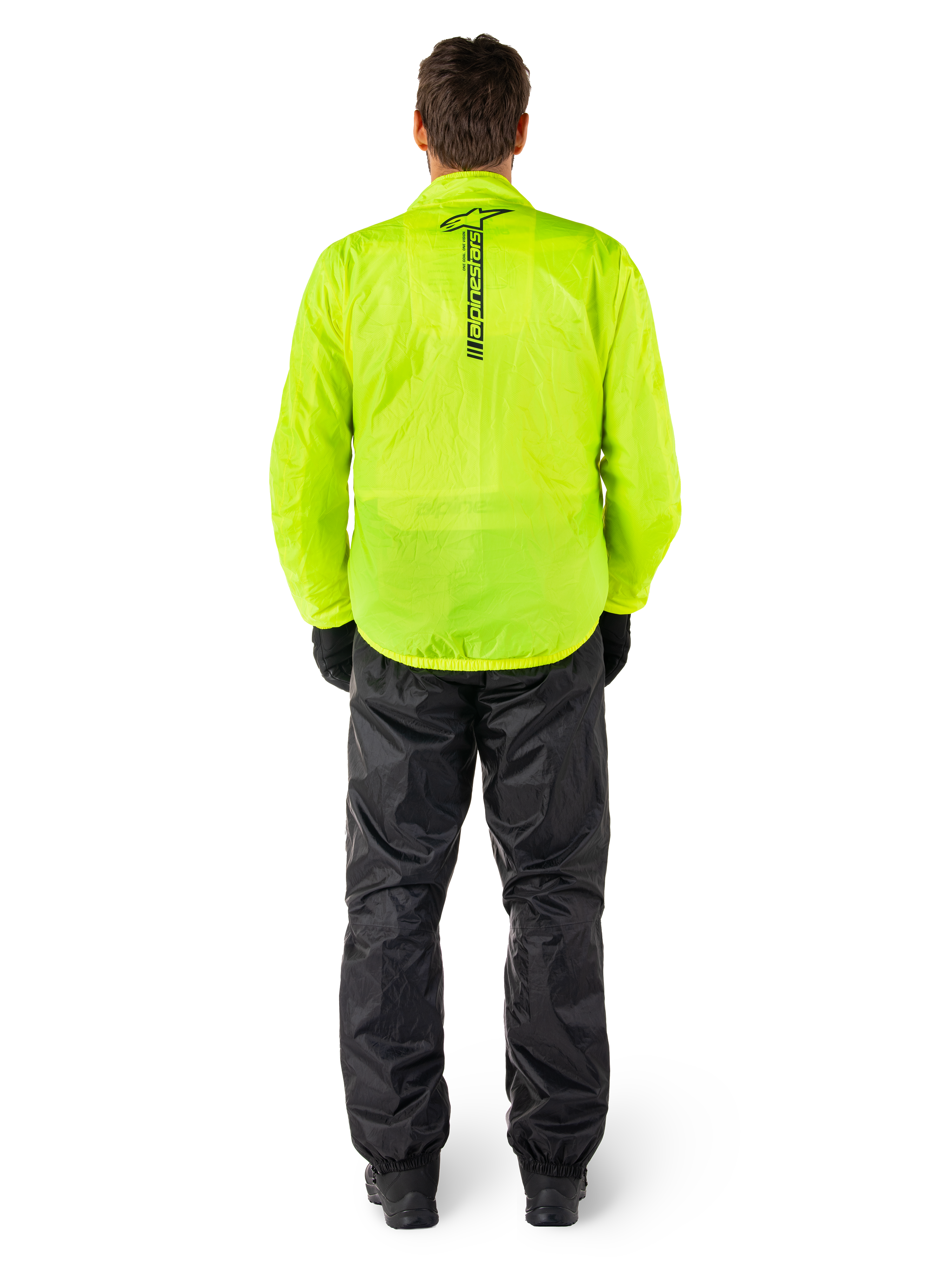 Giacca e pantaloni Alpinestars Hurricane Rain V2, tuta antipioggia impermeabile da moto, giacca giallo fluo con marchio nero verticale sul retro, pantaloni neri, materiale tecnico leggero progettato per la protezione durante la guida in condizioni di pioggia