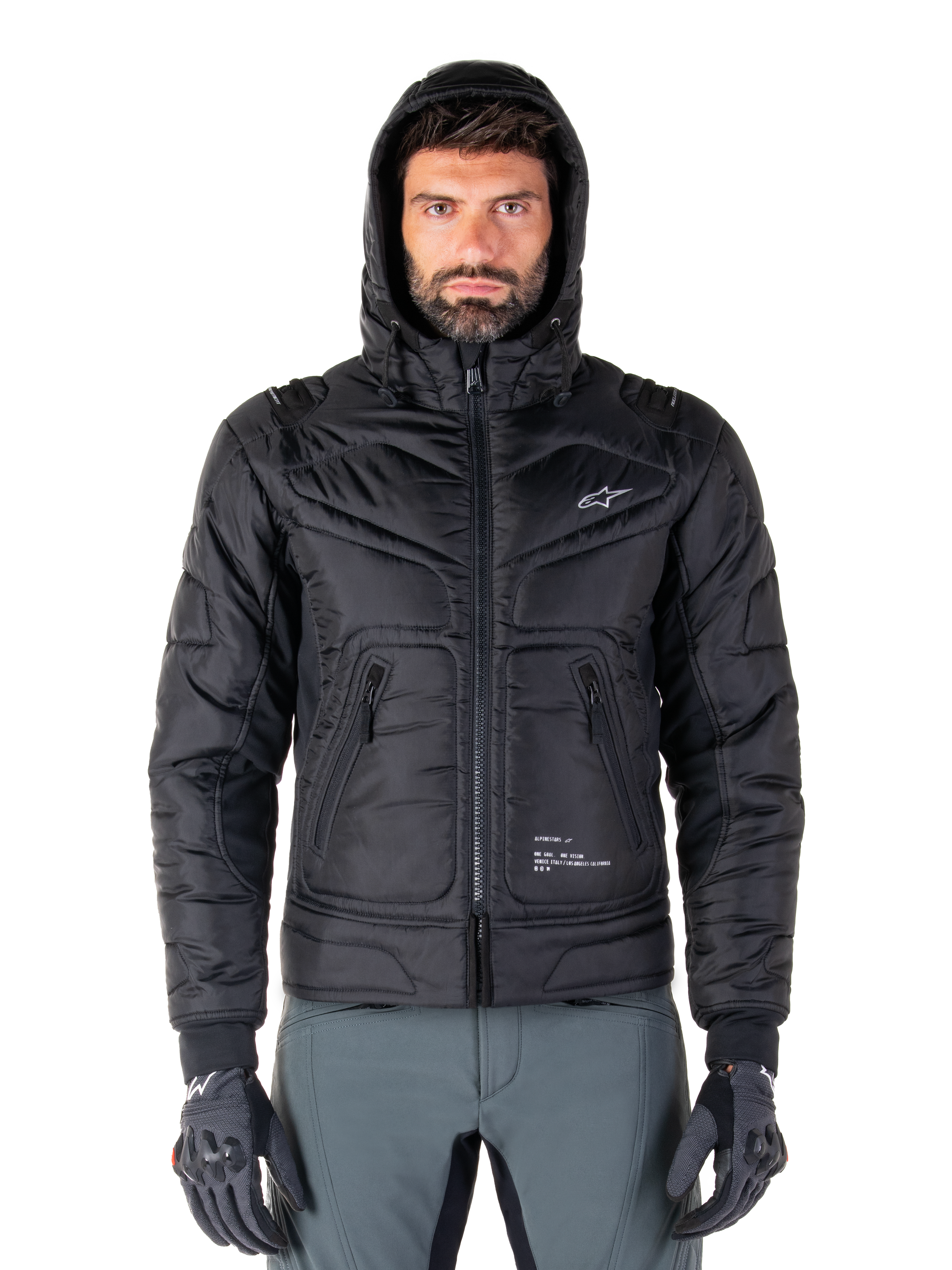 Giacca Alpinestars Mohobbs Waterproof, bomber da moto trapuntato nero, design con cappuccio e logo a stella bianco sul petto, chiusura frontale con zip, stile urban streetwear per motociclisti
