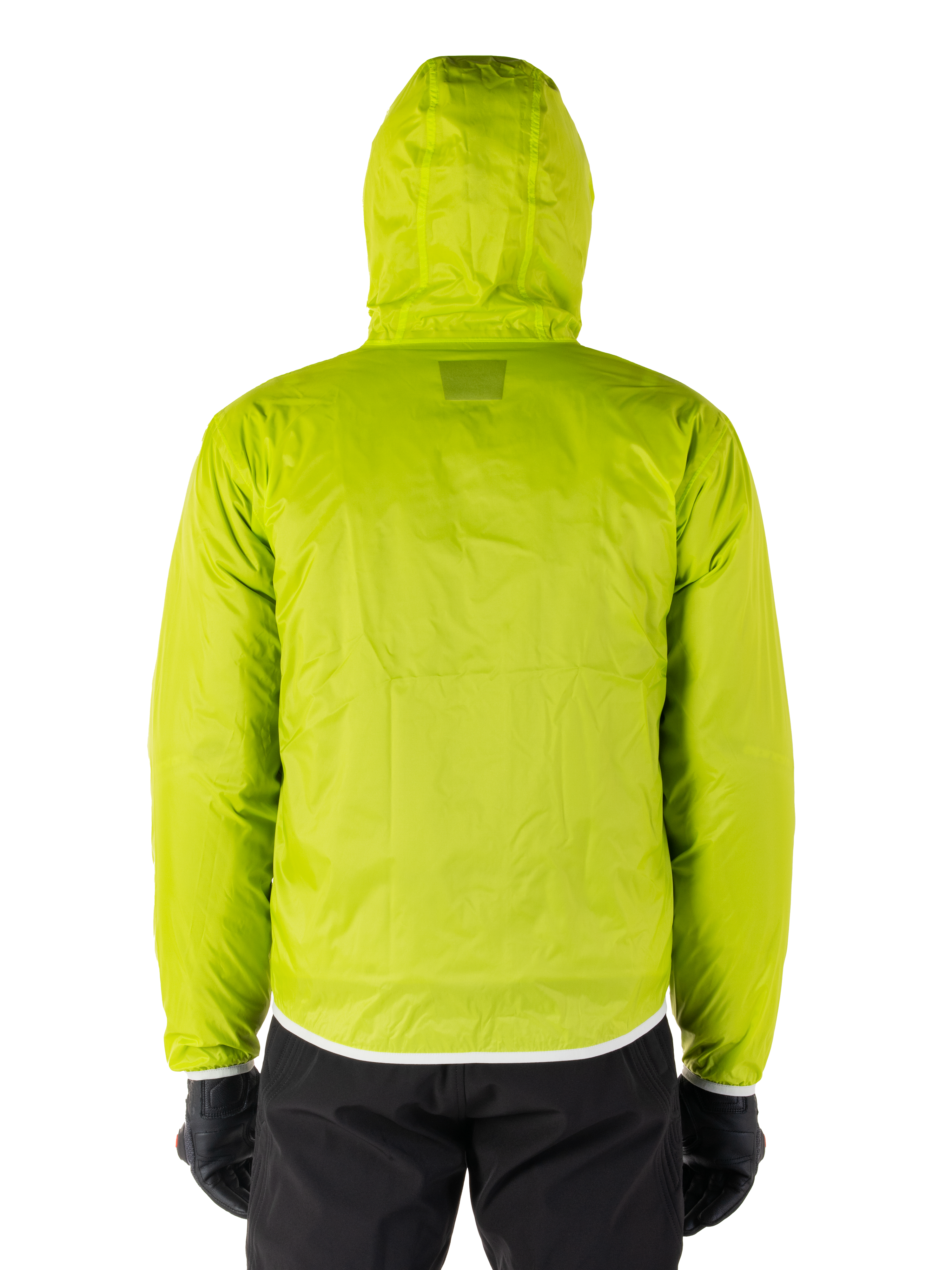 Giacca impermeabile Alpinestars Mohobbs, copertura antipioggia ripiegabile Lime Punch, giacca con cappuccio verde lime brillante, vista posteriore, indossata con pantaloni e guanti neri, streetwear moto impermeabile