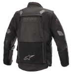Giacca Alpinestars Halo Drystar®, giacca da moto adventure touring, nero, vista posteriore con ampio pannello di ventilazione posteriore, marchio "astars adventure tech", inserti riflettenti su spalle e gomiti e tasca posteriore integrata con logo a stella