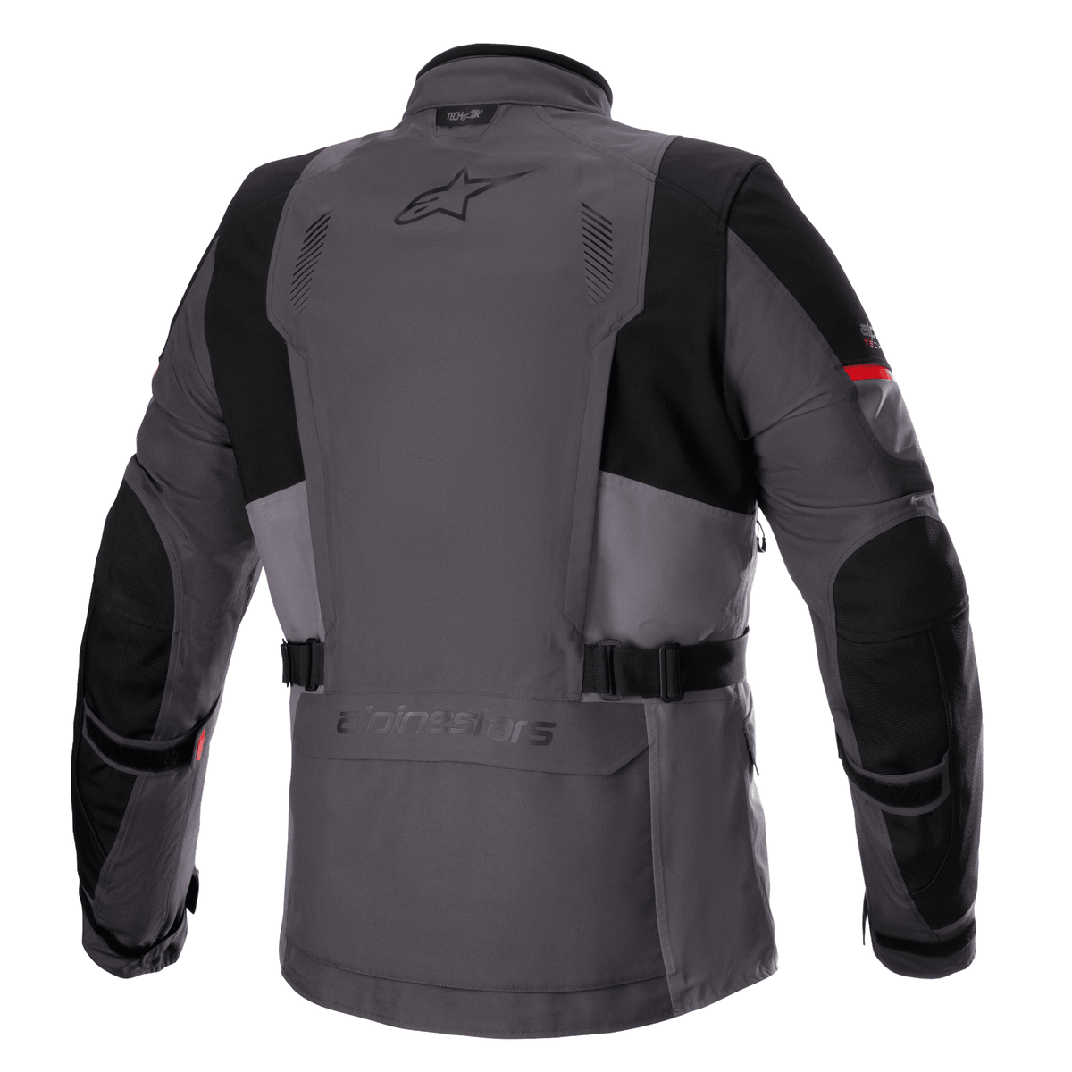 Alpinestars Monteira Drystar® XF Jacket, giacca da moto Adventure Touring, grigio scuro e grigio Tar con accenti rosso brillante, vista posteriore con tasca utility, cinghie in vita e pannelli neri rinforzati su spalle e gomiti, logo Astars sulla parte superiore della schiena