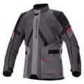 Alpinestars Monteira Drystar XF Jacket, giacca da moto touring, grigio scuro e grigio catrame con pannelli neri e accenti rosso acceso, con tasche cargo frontali, cinghie di regolazione su vita e braccia, logo Alpinestars verticale e collo alto, progettata per l'adventure riding