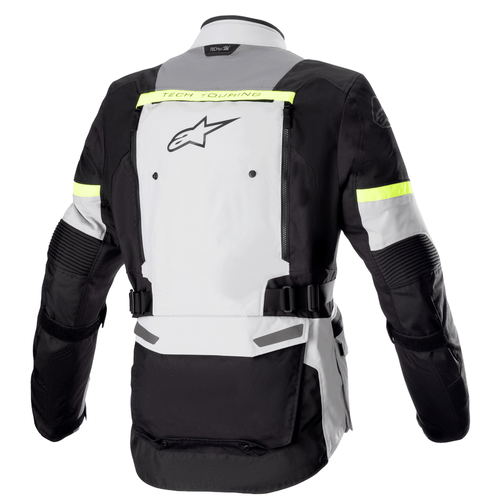 Giacca Alpinestars Bogota' Pro Drystar®, vista posteriore, grigio ghiaccio, grigio scuro e giallo fluo, con ampio pannello di ventilazione posteriore, inserti riflettenti giallo fluo e cinghie regolabili in vita, equipaggiamento moto adventure touring