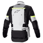 Giacca Alpinestars Bogota' Pro Drystar®, vista posteriore, grigio ghiaccio, grigio scuro e giallo fluo, con ampio pannello di ventilazione posteriore, inserti riflettenti giallo fluo e cinghie regolabili in vita, equipaggiamento moto adventure touring