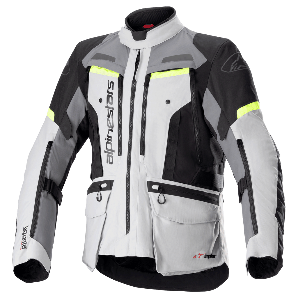 Giacca Alpinestars Bogotá Pro Drystar, giacca da moto adventure touring, grigio ghiaccio e grigio scuro con pannelli neri e accenti giallo fluo, dotata di tasche cargo multiple e cerniere di ventilazione, design in tessuto impermeabile e resistente per ogni condizione atmosferica