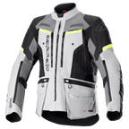 Giacca Alpinestars Bogotá Pro Drystar, giacca da moto adventure touring, grigio ghiaccio e grigio scuro con pannelli neri e accenti giallo fluo, dotata di tasche cargo multiple e cerniere di ventilazione, design in tessuto impermeabile e resistente per ogni condizione atmosferica