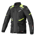 Giacca Alpinestars Andes V3 Drystar, giacca da moto touring, nero con accenti giallo fluo, dotata di prese d'aria sul petto con zip, grandi tasche cargo frontali, cinghie di regolazione in vita e marchio Alpinestars, abbigliamento tecnico da avventura impermeabile
