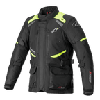 Giacca Alpinestars Andes V3 Drystar, giacca da moto touring, nero con accenti giallo fluo, dotata di prese d'aria sul petto con zip, grandi tasche cargo frontali, cinghie di regolazione in vita e marchio Alpinestars, abbigliamento tecnico da avventura impermeabile
