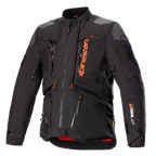 Giacca Alpinestars AMT-10R Drystar XF, nero e arancione, giacca da moto adventure touring, inserti grigi sulle spalle, cerniere multiple con tiranti arancioni, cinghie regolabili, fodera interna rossa, abbigliamento tecnico protettivo