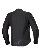 Alpinestars Stella T-Jaws V4 Waterproof Jacket, giacca da moto in tessuto da donna, nero su nero, vista posteriore con silhouette sportiva ergonomica, dettagli riflettenti e logo sulla parte bassa della schiena