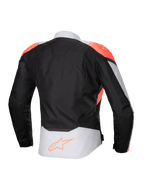 Giacca impermeabile Alpinestars Stella T-Jaws V4, giacca da moto da donna, nero, grigio ghiaccio e corallo fluo, vista posteriore con accenti corallo fluorescente sulle spalle e logo Alpinestars sulla parte bassa della schiena, costruzione in tessuto tecnico per la guida in ogni condizione meteo.