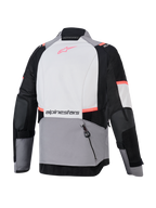Alpinestars Giacca Stella Andes V4 Drystar, giacca da moto adventure da donna, grigia e nera, vista posteriore con tasca portaoggetti, membrana Drystar impermeabile e traspirante.