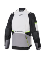 Giacca Alpinestars Stella Andes V4 Drystar®, giacca da moto adventure da donna, grigio ghiaccio, grigio scuro e nero con accenti giallo fluo, vista posteriore che mostra la grande tasca posteriore e il marchio Alpinestars