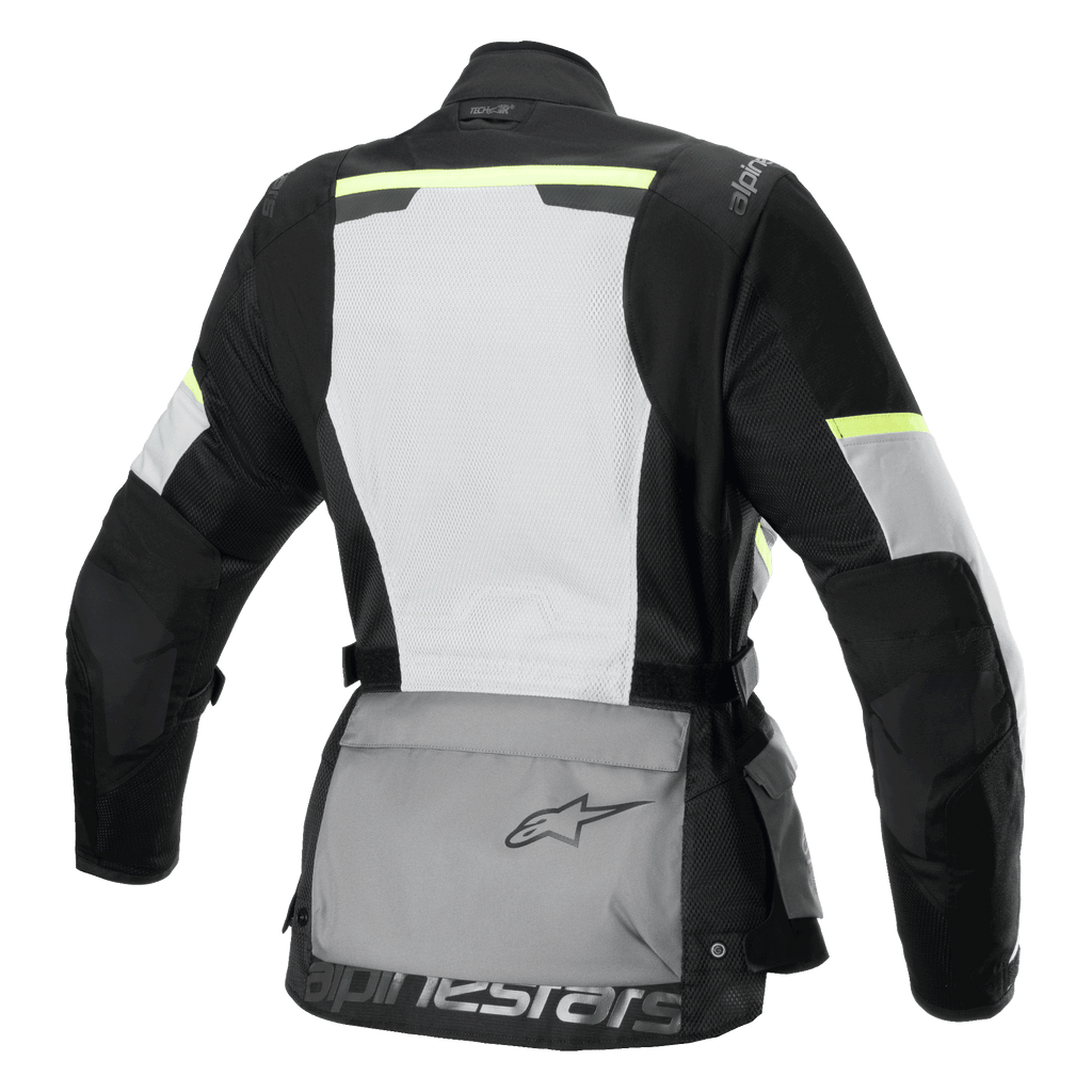 Giacca Alpinestars Stella Andes Air Drystar®, giacca da moto touring da donna, vista posteriore, Grigio Ghiaccio, Grigio Scuro e Nero, caratterizzata da un ampio pannello posteriore in rete bianca, tasca portaoggetti posteriore grigia con logo, dettagli giallo alta visibilità e costruzione in tessuto per flusso d'aria e protezione.