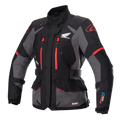 Giacca Alpinestars Stella Honda Andes V3 Drystar da donna, giacca da moto touring, nera e grigia con dettagli rosso acceso, logo Honda Wing sul petto, cerniere rosse, cinturini regolabili in vita e sulle braccia e costruzione impermeabile resistente