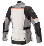 Giacca Alpinestars Stella Andes V3 Drystar® da donna, giacca da moto, grigio ghiaccio, grigio scuro, nero e corallo, vista posteriore con ampia tasca porta-attrezzi sul fondo schiena, cintura di regolazione in vita e accenti corallo su spalle e schiena