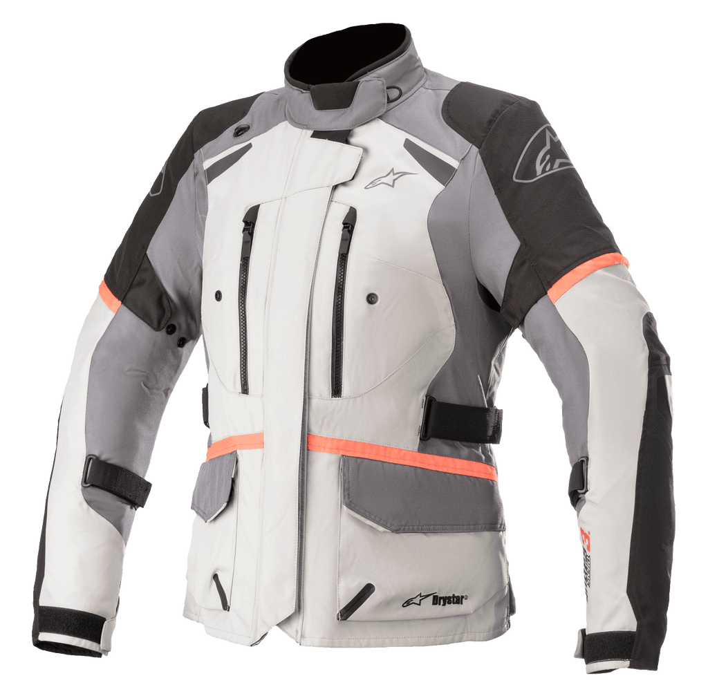 Giacca Alpinestars Stella Andes V3 Drystar da donna, giacca da moto touring, grigio ghiaccio con pannelli grigio scuro e neri, vivaci accenti corallo, con prese d'aria sul petto con zip, grandi tasche a patta e cinghie regolabili in vita, costruzione in tessuto tecnico per guida adventure in ogni condizione climatica