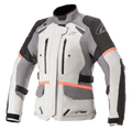 Giacca Alpinestars Stella Andes V3 Drystar da donna, giacca da moto touring, grigio ghiaccio con pannelli grigio scuro e neri, vivaci accenti corallo, con prese d'aria sul petto con zip, grandi tasche a patta e cinghie regolabili in vita, costruzione in tessuto tecnico per guida adventure in ogni condizione climatica