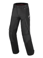 Alpinestars Andes V4 Drystar® Pants - Long, pantaloni da moto adventure-touring neri, con ampie tasche cargo, pannelli rinforzati sulle ginocchia, ventilazione con zip sulle cosce e logo Alpinestars bianco sulla coscia sinistra.