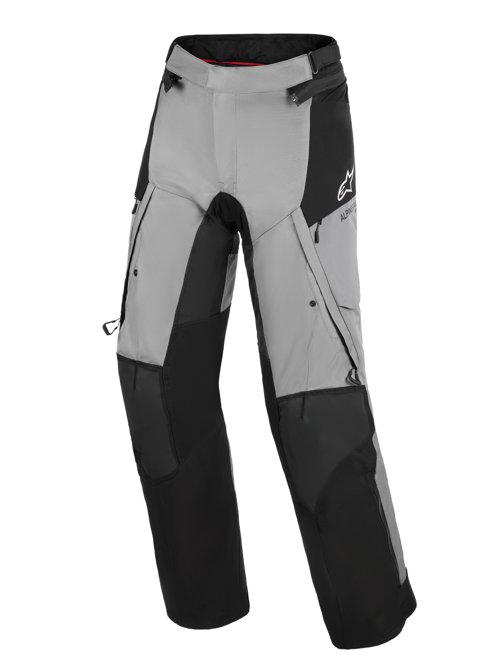 Alpinestars Andes V4 Drystar® Pants, pantaloni da moto adventure, nero e grigio scuro, con pannelli neri rinforzati su ginocchia e stinchi, prese d'aria con cerniera sulle cosce e tasche cargo, logo Alpinestars bianco sull'anca, progettati per la guida su strada e adventure in tutte le condizioni atmosferiche.