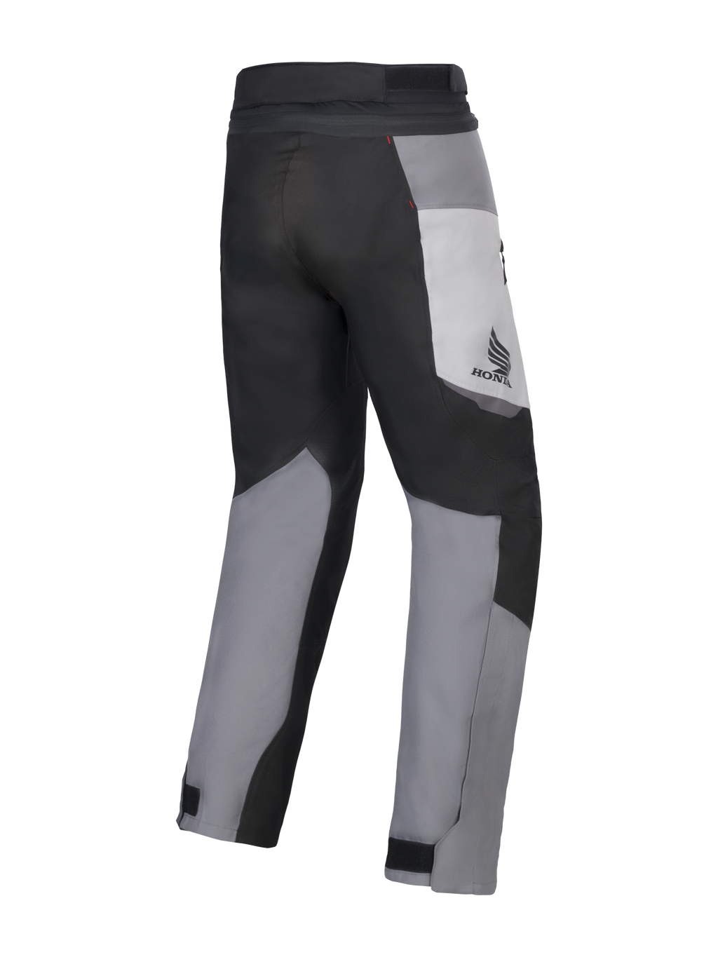 Alpinestars Honda St-1 Waterproof Pants, pantaloni da touring per moto, grigio ghiaccio, grigio scuro e nero, vista posteriore con design tessile multi-pannello, logo Honda sulla coscia e chiusure regolabili alle caviglie per la guida in ogni condizione climatica.