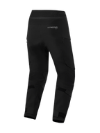 Alpinestars Pantaloni Andes Pro Drystar® XF - Versione corta, pantaloni da moto neri, vista posteriore con logo Alpinestars, cinturini in velcro regolabili su polpacci e caviglie, prese d'aria con zip e costruzione in tessuto resistente per l'adventure touring.