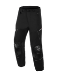 Alpinestars Pantaloni Andes Pro Drystar® XF - Corti, pantaloni da moto per adventure touring, nero e grigio scuro, robusta costruzione in tessuto, pannelli sulle ginocchia rinforzati con finitura testurizzata, cintura regolabile con fibbia in vita, prese d'aria con zip, logo Drystar® XF, abbigliamento tecnico resistente per ogni condizione climatica