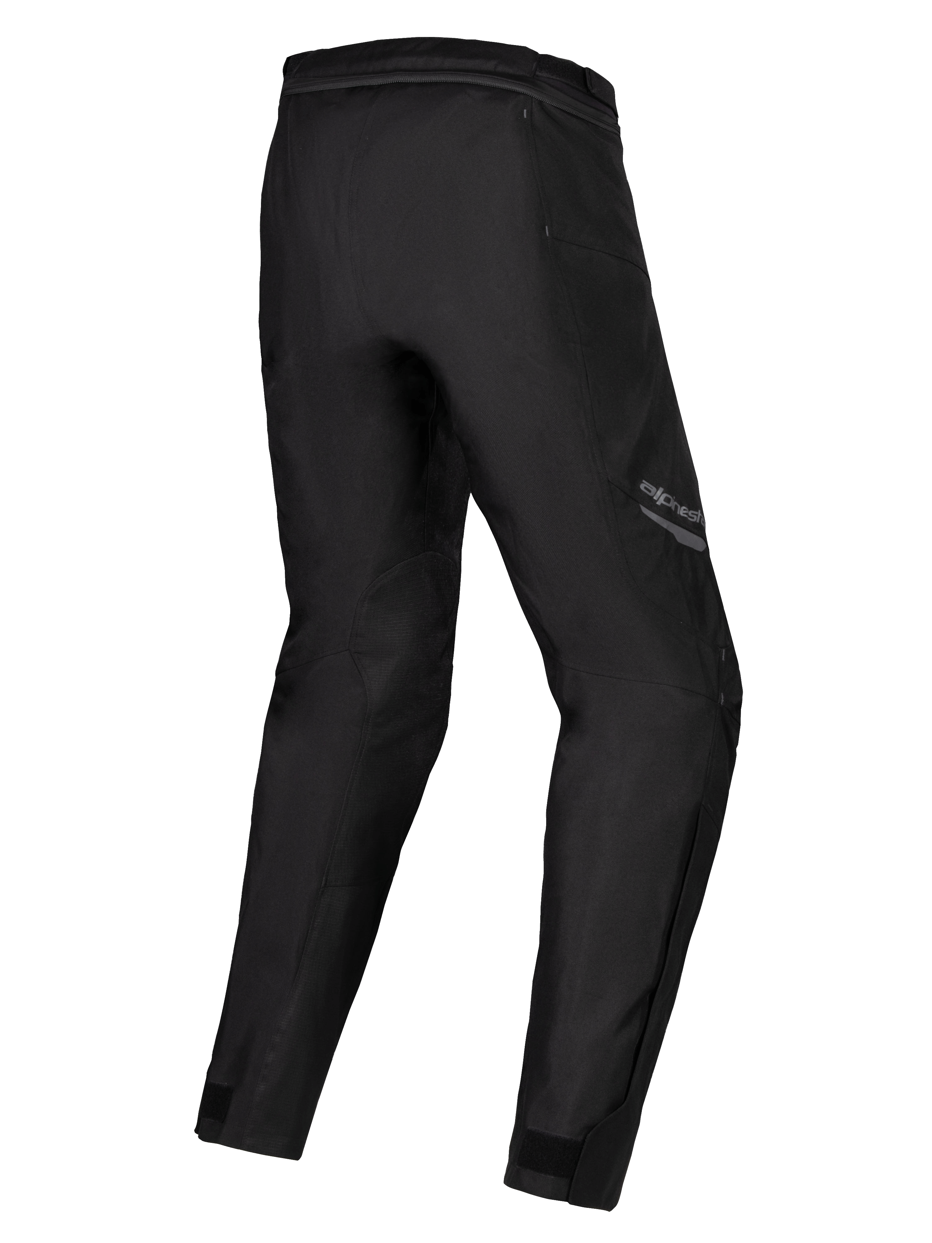 Alpinestars Stella ST-1 Waterproof Pants, pantaloni da moto da donna, nero, vista posteriore a tre quarti che mostra le gambe precurvate, costruzione in tessuto con cerniera di collegamento in vita e regolatori alle caviglie, equipaggiamento adventure touring