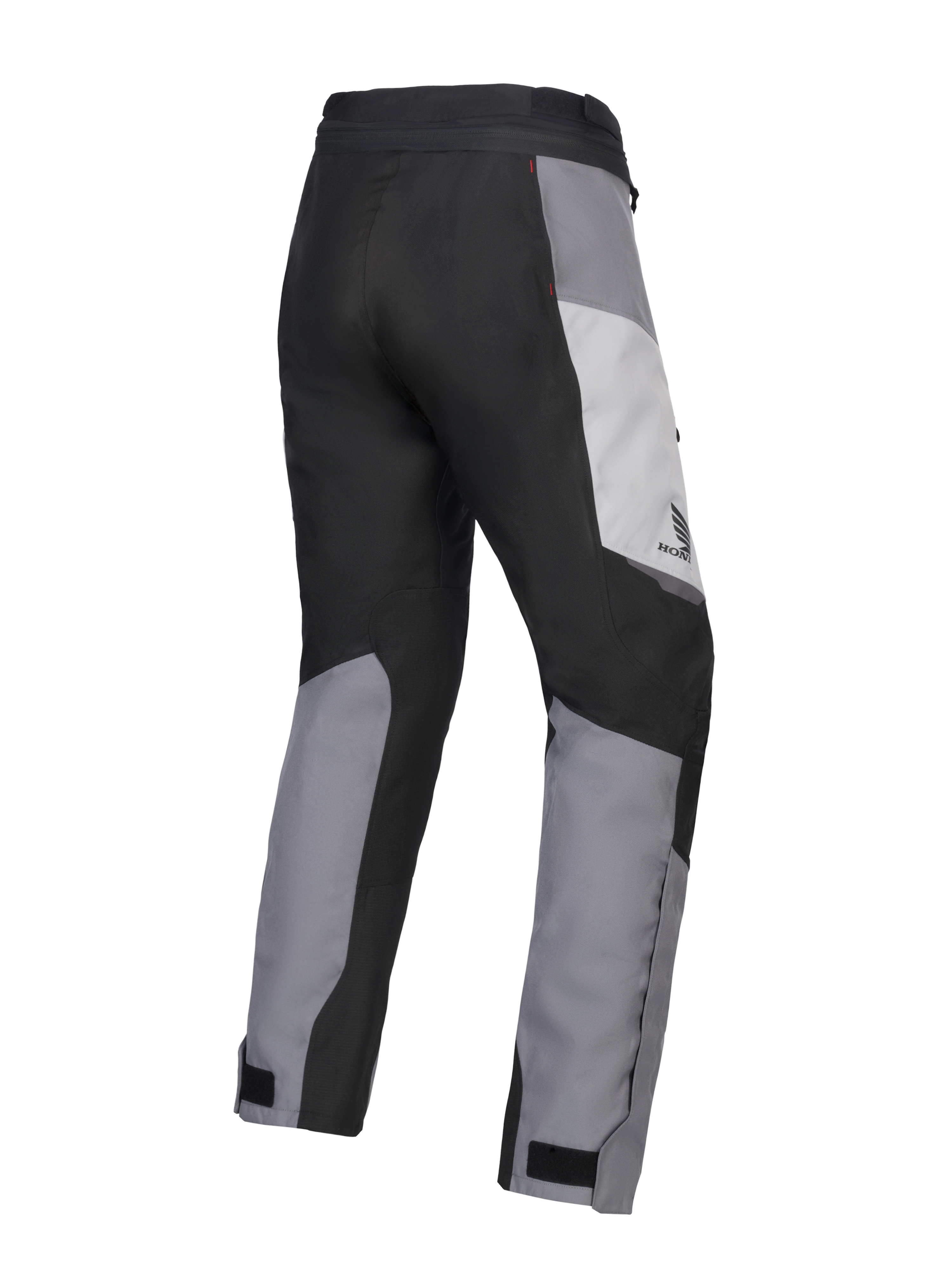Alpinestars 2025 Honda Stella ST-1 Waterproof Pants, pantaloni da moto touring da donna, Ice Gray, Grigio Scuro e Nero, vista posteriore a tre quarti che mostra la costruzione in tessuto resistente, pannelli color-block grigi e neri, marchio Honda sul fianco e chiusure regolabili alle caviglie.