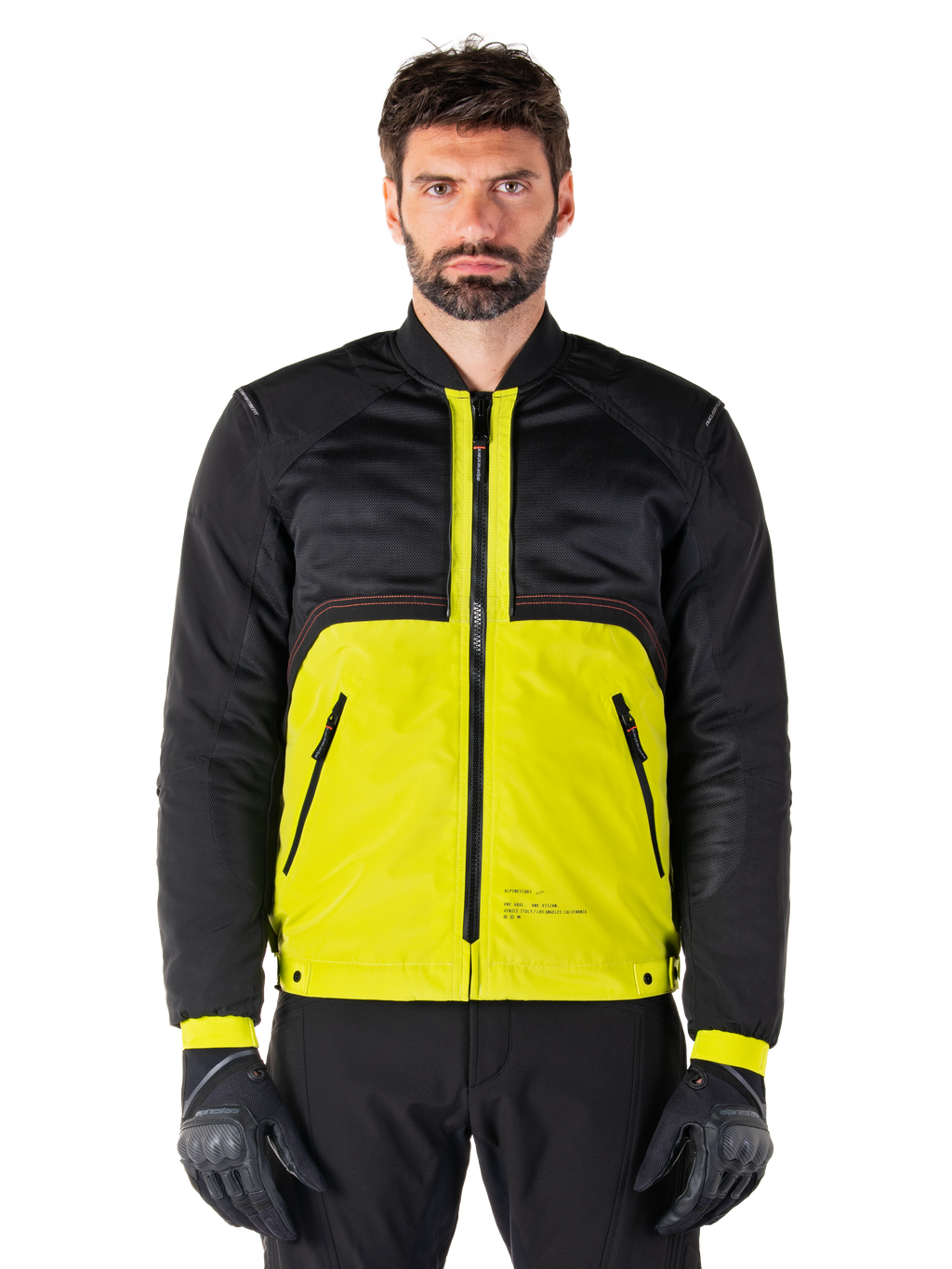Mootant Waterproof Parka, giacca da moto modulare, Lime Punch e nero, indossata da un modello con guanti e pantaloni neri, caratterizzata da una parte inferiore giallo vibrante e busto superiore e maniche in nero, design utilitaristico per la guida in ogni condizione atmosferica