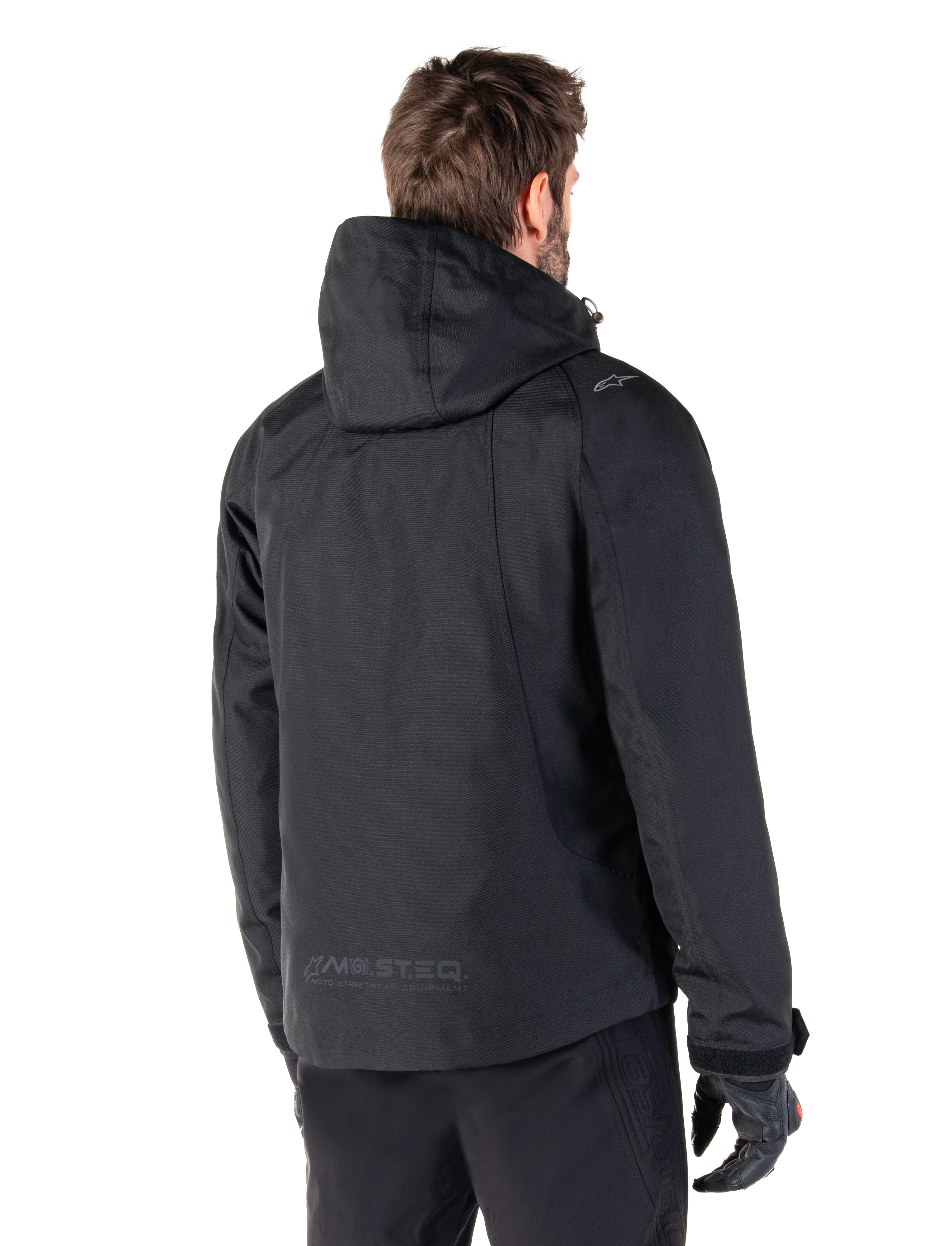 Parka Morush impermeabile Alpinestars, giacca da moto urban nera da uomo, vista posteriore con cappuccio e logo MO.ST.EQ.