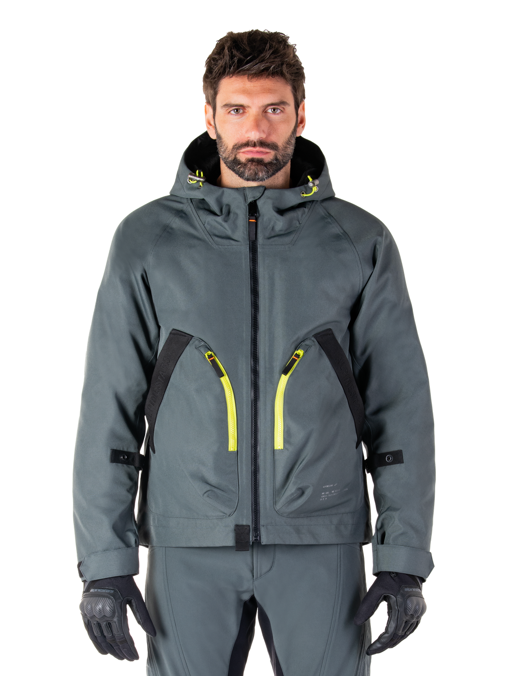 Alpinestars Morush Waterproof Parka, giacca da moto grigio urbano, cerniere giallo vivace e dettagli neri, design con cappuccio e ampie tasche anteriori, stile tecnico ispirato allo streetwear
