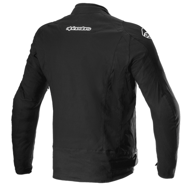 A black Alpinestars EU textile T-GP Force Jacket featuring long sleeves, a front zipper, and the Alpinestars logo prominently displayed on the chest. This jacket boasts protective features with padding on the shoulders and elbows, additional branding on the upper arms, and compatibility with the Tech-Air® 5 Airbag System.