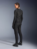Alpinestars Giacca Stella Troop-Air da donna, nero, vista posteriore, indossata con pantaloni da moto, guanti e stivali coordinati neri, costruzione in mesh tecnico slim-fit per la guida urbana