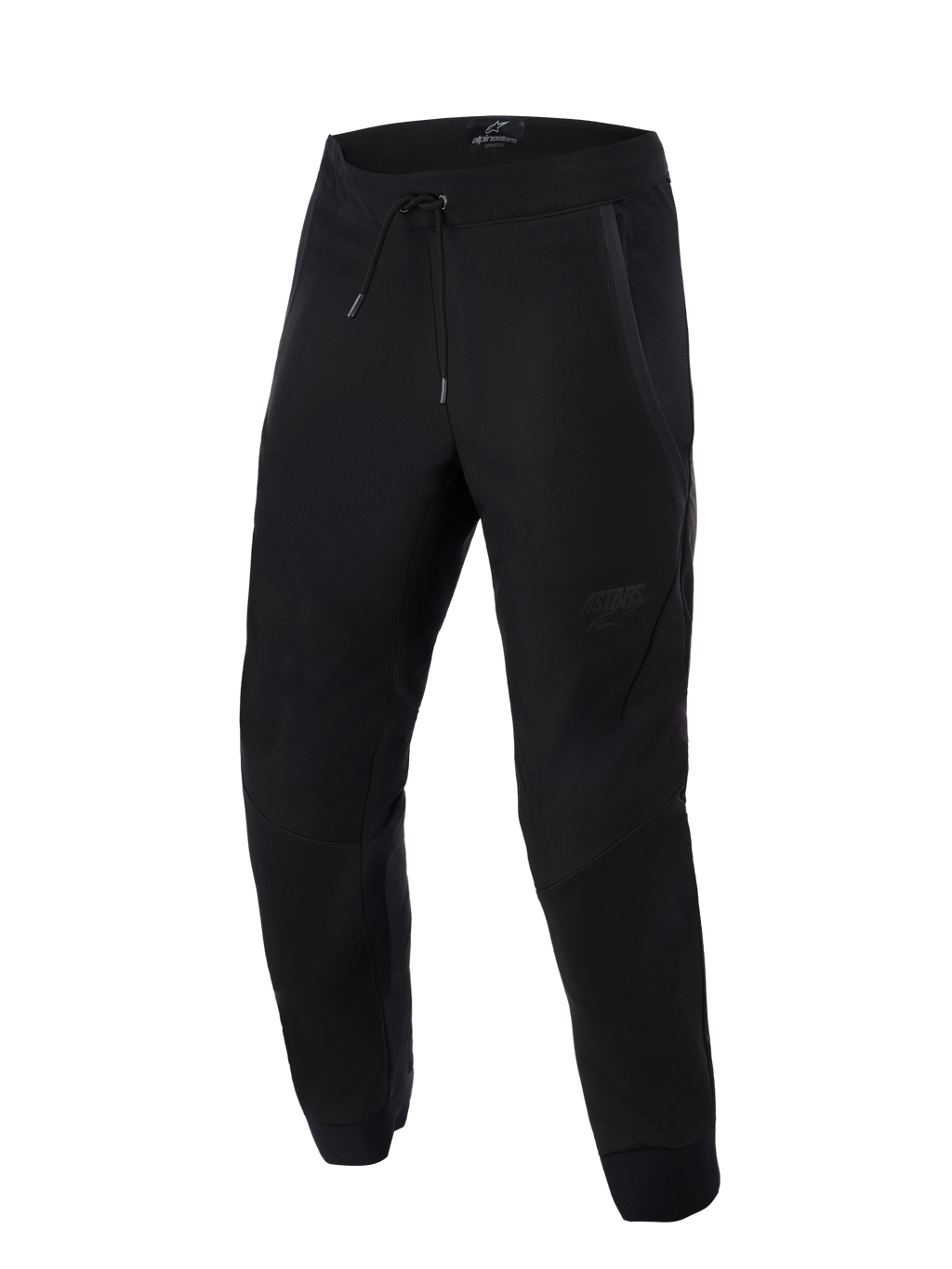 Pantaloni Alpinestars Aeroshell Airflow, nero, pantaloni da moto sportivi e touring leggeri, caratterizzati da ampi pannelli in rete per la ventilazione, vita elasticizzata con coulisse, gambe pre-curvate e discreto logo tono su tono sulla coscia.