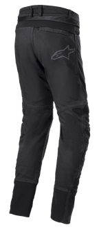 Pantaloni Alpinestars SP Pro, pantaloni tecnici sportivi da moto neri, vista posteriore con cerniera di connessione in vita, inserti elasticizzati RIDEKNIT sul carré posteriore e sui polpacci, logo discreto.
