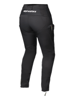 Pantaloni da donna Alpinestars Actea, nero, vista posteriore con logo bianco sulla fascia in vita, silhouette affusolata con tasca cargo laterale, zip alle caviglie, moderni pantaloni da moto