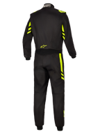 Alpinestars Tuta GP Race V3 FIA, tuta da auto, nero e giallo fluo, vista posteriore con accenti giallo fluorescente su spalle e gambe, piccolo logo giallo sulla parte bassa della schiena, etichetta di certificazione FIA sul colletto