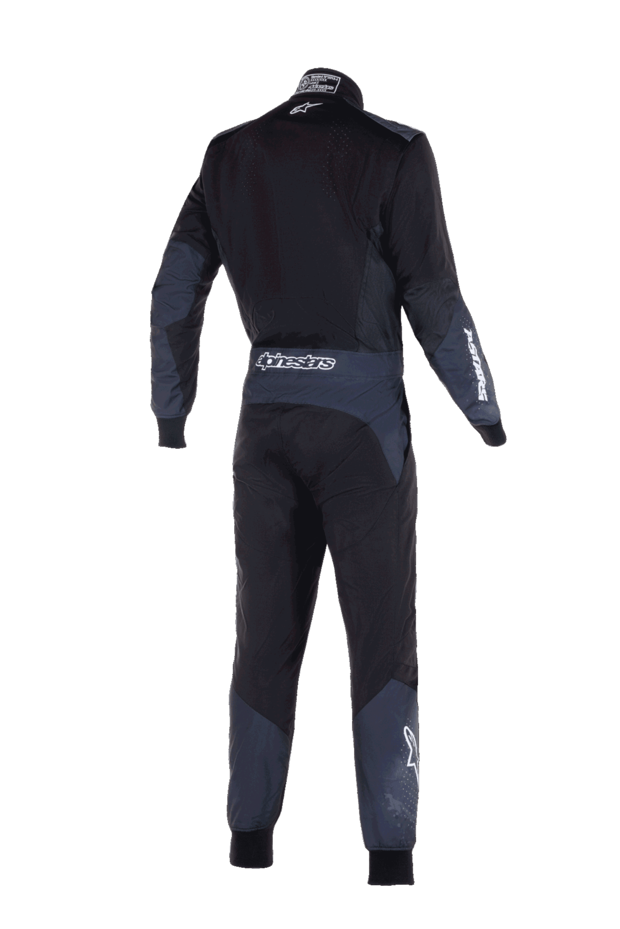 Tuta Alpinestars KMX-5 V3, tuta da karting, nero e dark shadow, vista posteriore con logo Alpinestars bianco sulla vita e sulla manica, pannelli tecnici grigio scuro su braccia e gambe, design sportivo ad alte prestazioni.