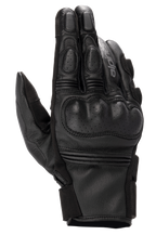 Alpinestars Phenom Leather Gloves, guanti da moto, nero, vista dall'alto che mostra la protezione rigida delle nocche traforata, dita rinforzate, inserti elasticizzati a soffietto e struttura in pregiata pelle di capra.