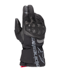 Alpinestars WT-4 Gore-Tex Insulated Glove, guanto da moto nero, protezione nocche rigida, struttura in pelle e tessuto, tecnologia impermeabile GORE-TEX, logo e scritta Alpinestars argento sul polsino, dettaglio rosso sul polso, guanto da guida invernale