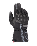 Alpinestars WT-4 Gore-Tex Insulated Glove, guanto da moto nero, protezione nocche rigida, struttura in pelle e tessuto, tecnologia impermeabile GORE-TEX, logo e scritta Alpinestars argento sul polsino, dettaglio rosso sul polso, guanto da guida invernale