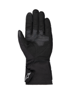 Alpinestars Wt-1 Drystar® Guanti Termici, guanti da moto, nero, vista del palmo con aree di grip in tessuto rinforzato, polsino lungo con logo Alpinestars bianco sul cinturino, costruzione resistente agli agenti atmosferici per la guida su strada