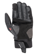 Guanti Alpinestars Hyde XT Drystar® XF, guanti da moto, nero, vista del palmo con rinforzi in scamosciato sintetico e texture in pelle, logo Drystar XF Extra Flow sul pollice, polsino di media lunghezza con cinturino di sicurezza al polso, design adventure touring