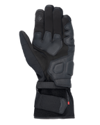 Guanti Alpinestars Tourer W-7 V2 Drystar®, guanti da moto neri, vista del palmo con rinforzi in pelle, aree di presa imbottite, polpastrello compatibile con touchscreen e chiusura sicura con cinturino al polso.