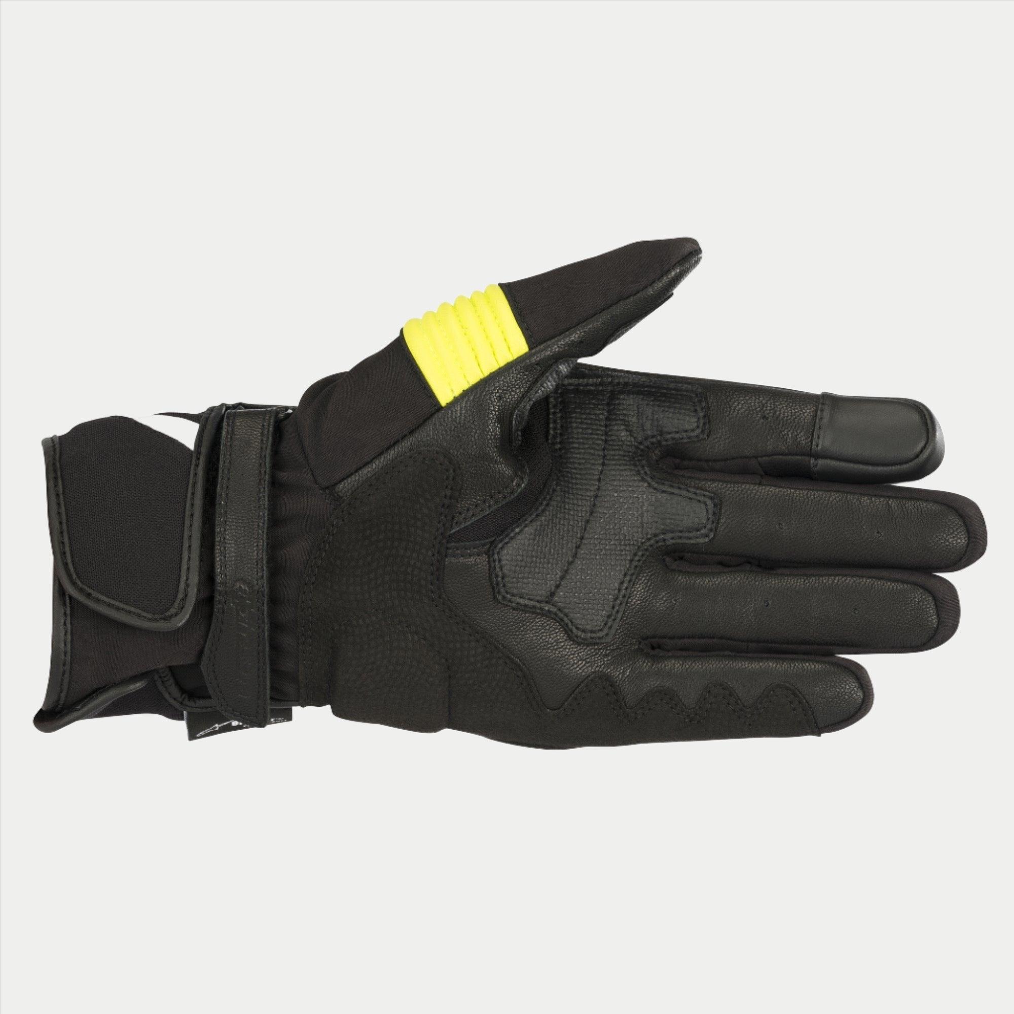 Guanti Alpinestars T-SP W Drystar®, Nero e Giallo Fluo, vista del palmo che mostra la costruzione in pelle caprina con accenti giallo fluorescente sul pollice, punta delle dita compatibile con touchscreen e doppia chiusura del polso con velcro.