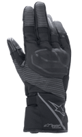 Alpinestars Guanti Stella Andes V3 Drystar da donna, Nero Antracite, vista del dorso con protezione nocche integrata, pannelli ripstop riflettenti, logo Alpinestars e marchio Drystar Performance sul polsino, abbigliamento moto adventure touring